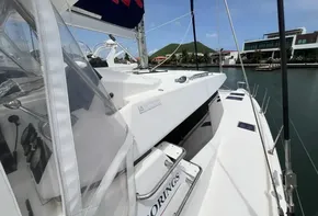 2019 Leopard 45 catamaran docked at a marina with clear skies.