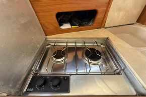 Stainless steel stove in 1991 Sealine 290 Ambassador boat kitchen area.