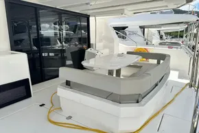 2025 Robertson and Caine Leopard 46 Powercat, featuring outdoor seating and sleek design.