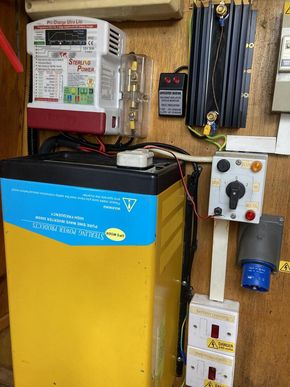 Electrical panel with 3kw Sterling inverter, new 30amp sterling battery charger and galvanic isolator for Hull protection.