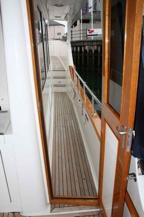 Aft cockpit to side deck from aft cockpit weather door