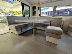 Interior of 2019 Leopard 40 yacht with modern seating and table.