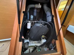 Engine compartment of 2019 Jeanneau Sun Odyssey 440 sailboat, showcasing mechanical components.