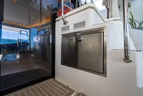 Luxury yacht interior with stainless steel appliances, Leopard 50 model, 2022.
