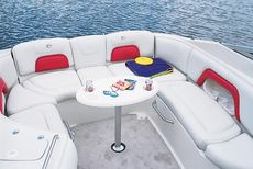 Crownline Bowrider 270 BR - The standard U-wrap cockpit area comes standard with walk-thru filler cushions and cockpit table
