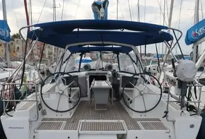 2019 Beneteau Oceanis 41.1 sailboat docked, featuring dual steering wheels and spacious deck.