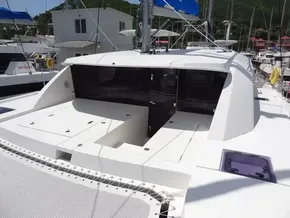 2021 Leopard 40 catamaran with open deck and modern design in marina setting.