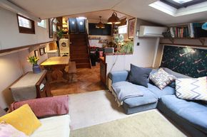 living room area with comfy sofa