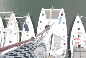 Aerial view of Lagoon 42 catamaran, 2017 model, docked among other boats.