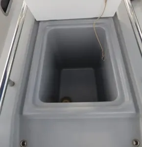 Beneteau Oceanis 41.1 2019 yacht storage compartment with metal railing.