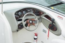 Crownline Bowrider 270 BR - The optional wood-grain dash shown here comes with lifetime warranted gauges and instrumentation