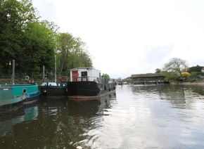 Peaceful stretch of river, Humber barge seen on inside mooring