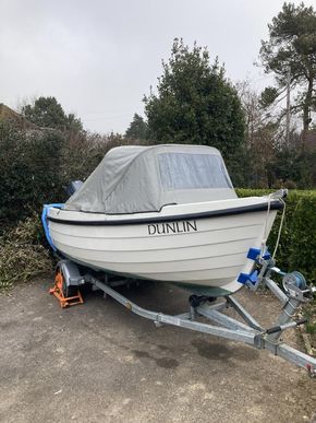 Boat trailer and wheel clamp