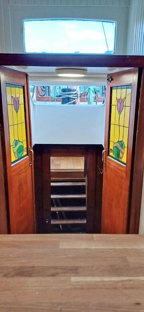 Steps down to the bedroom under the kitchen.