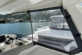 2025 Robertson and Caine Leopard 46 Powercat interior view with marina backdrop.