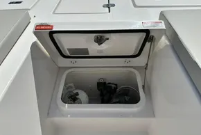 Open storage compartment on 2025 Robertson and Caine Leopard 46 Powercat, labeled 