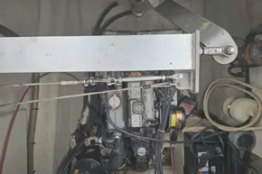 Engine compartment of a 2008 Leopard 38, showcasing mechanical components and wiring.