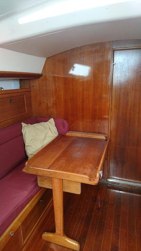 Port double with fold away table