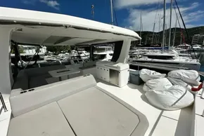 2022 Leopard 53 Powercat yacht interior with spacious seating and marina view.