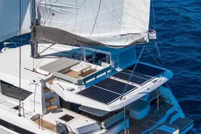 Modern Leopard 46 yacht with solar panels sailing on blue ocean, 2025 model.
