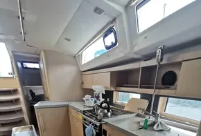 Interior of 2020 Beneteau Oceanis 46.1 yacht, featuring modern kitchen and sleek cabinetry.