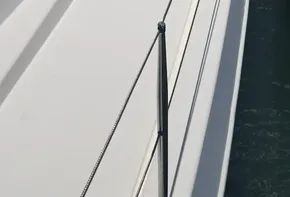 2017 Leopard 48 yacht docked at marina, side view.