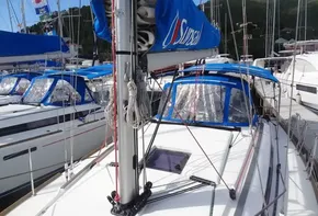 2017 Jeanneau Sun Odyssey 389 sailboat docked in marina.