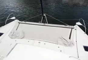 Leopard 50 catamaran 2020 model with netted trampoline deck on calm water.