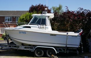 Merry Fisher 580 Mercury 90 Trailer