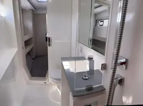 Modern bathroom interior in a 2020 Leopard 50 yacht, featuring sleek fixtures and ample lighting.