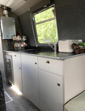 Fridge Freezer, sink with glass cover 