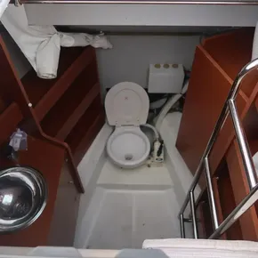 Interior of 2018 Beneteau Oceanis 51.1 yacht bathroom with toilet and sink.