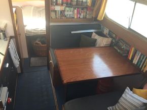 Interior of cabin, looking in from aft cockpit. V-berth visible at end.