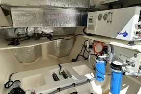 Engine room of 2025 Leopard 46 Powercat with water filtration system.