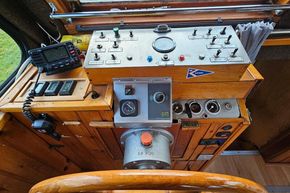 Control panel of a 1921 Classic Dutch Barge with vintage navigation equipment.