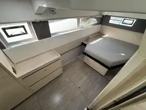 Modern cabin interior of 2020 Leopard 50 yacht with bed and storage.