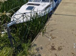 Cuddy Cabin moored on River Great Ouse