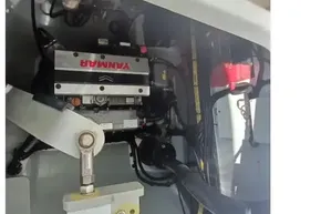 Engine compartment of a 2022 Leopard 45 catamaran featuring a Yanmar engine.
