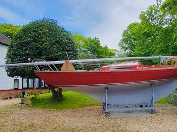 Folkboat with metal mast and boom