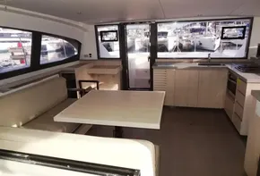 Interior of 2017 Leopard 43 Powercat with modern kitchen and dining area.