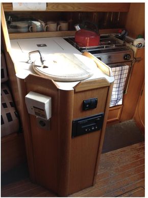 Galley with sink, fridge, cooker and storage