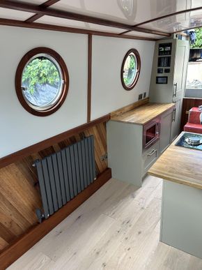 Microwave and cupboard with built in washer
