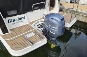 2023 Balt 818 Titanium boat with Yamaha 50 engine, docked at marina.