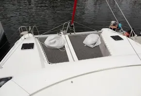 Lagoon 42 catamaran 2020 model, front deck with netting and water view.