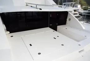 2018 Leopard 43 Powercat rear deck with storage compartments and seating.
