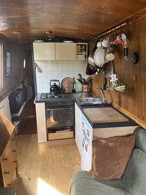 The galley, with vanette stove and 4 hobs, new sink and shoreline fridge.