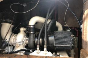 Engine compartment of a 1989 Princess 35 Flybridge boat, showcasing mechanical components.