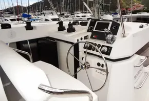 Leopard 45 2017 yacht helm station with modern navigation equipment in marina.