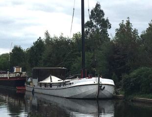 22M Barge on residential mooring