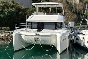 2024 Leopard 40 Powercat yacht docked in a serene marina setting.